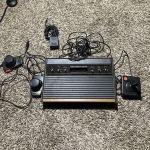 Atari Video Computer System Console with Black and Woodgrain Finish